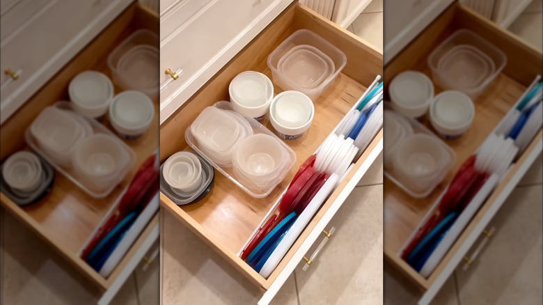 Organized kitchen drawer with tension rod to separate food containers and lids