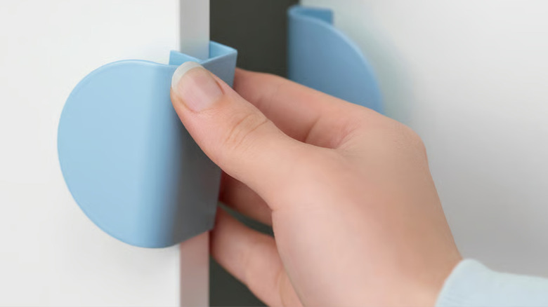 Blue clip-on LATMASK handle from IKEA