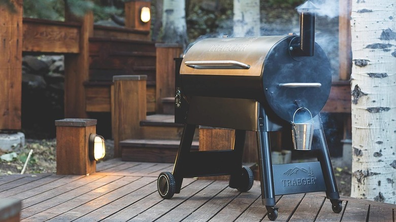 Traeger wood pellet grill and smoker on deck