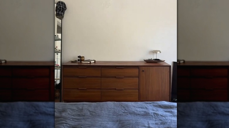 An American of Martinsville dresser against a white wall
