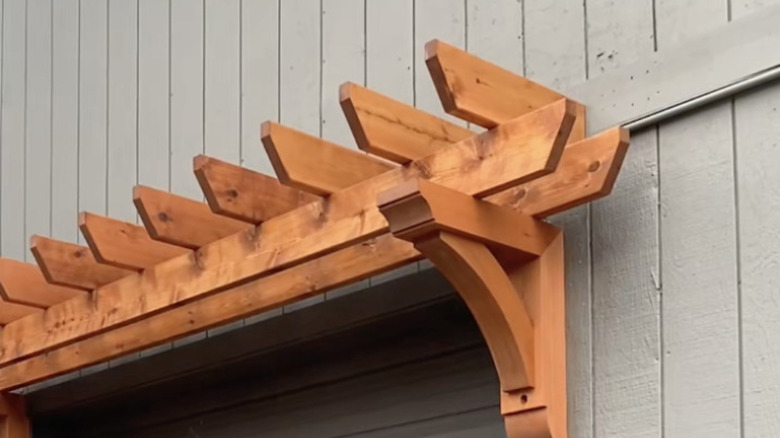 close up of DIY cedar garage pergola