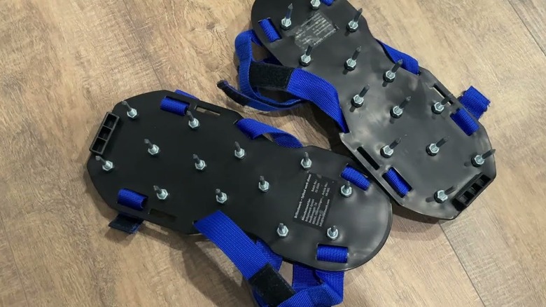 Briliantwerk Lawn Aerator Shoes on a wood floor