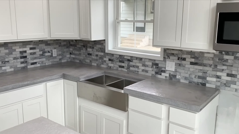 Concrete countertops installed during a kitchen renovation project