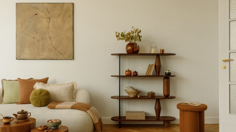 A warm, cream-colored minimalist living room