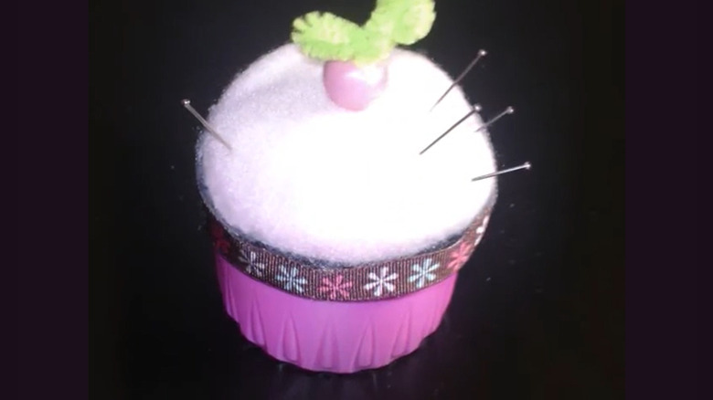 Cupcake pincushion made from a liquid laundry detergent cap