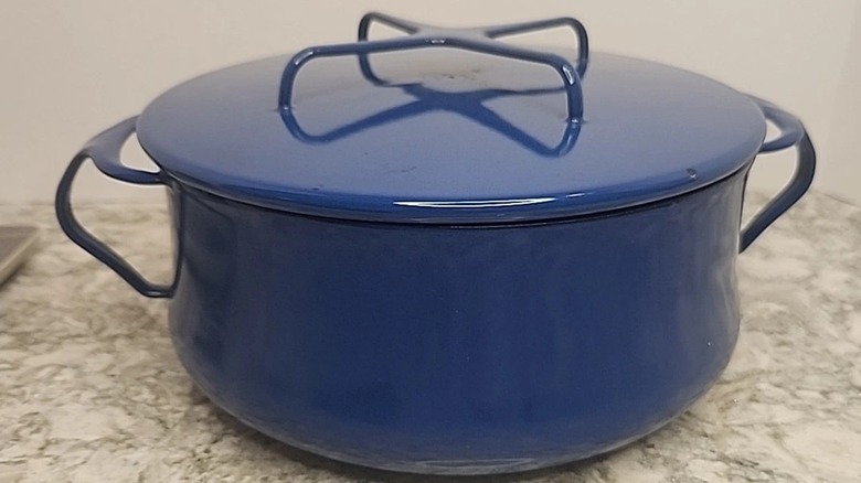A bright blue, vintage Dansk Købenstyle Dutch oven.