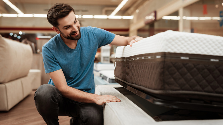 person in mattress store