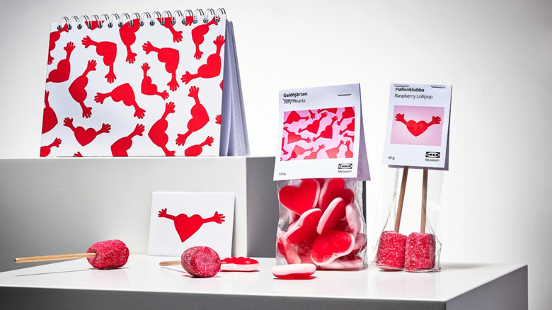 A notebook and packaged sweets featuring IKEA's FAMNIG design are shown in a product shot