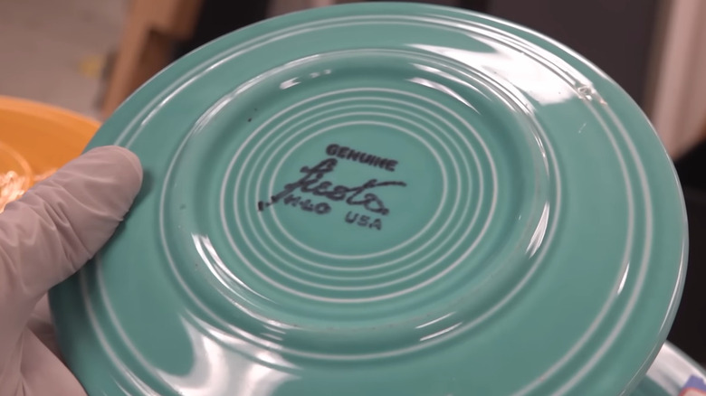 Teal fiestaware plate with the Fiesta logo