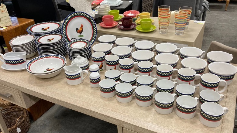 A full set of International China Company's Ella's Rooster dinnerware