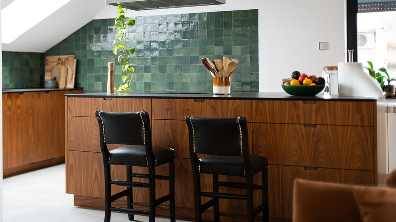 Kitchen with honey oak cabinets and sage walls
