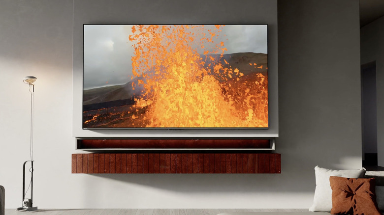 A Hisense flat-screen TV in a modern living room with neutral colors