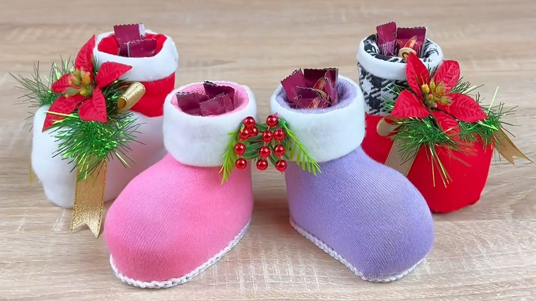 Holiday gift shoes made from toilet paper roll and detergent cap