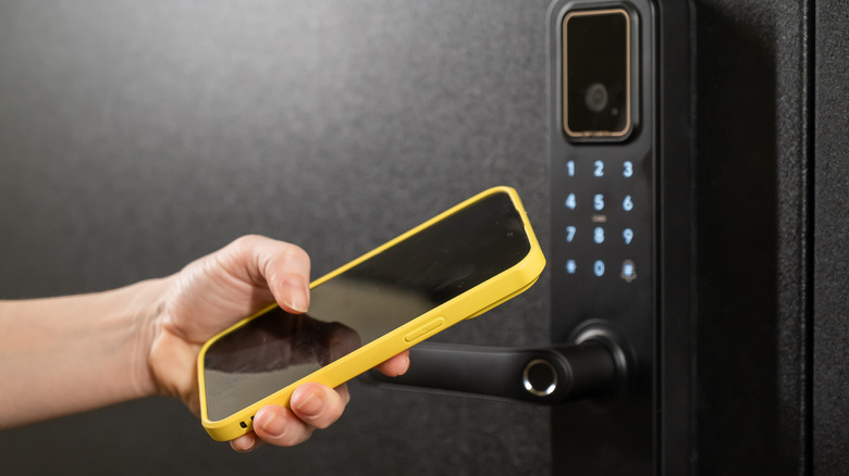 Modern smart door lock with digital keypad and keyless entry via smartphone