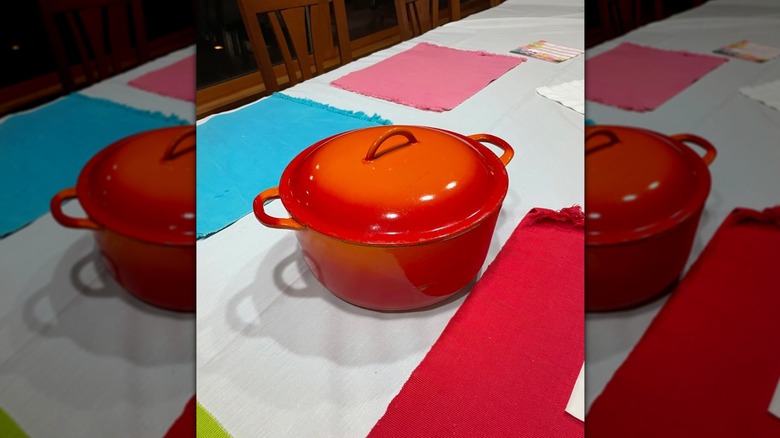 A Descoware Dutch oven on a table.