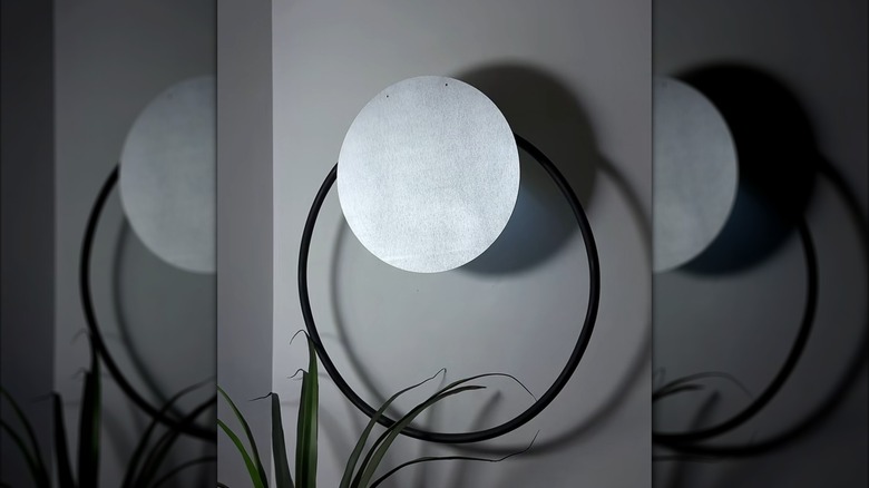 Dollar Tree hula hoop turned into modern wall art
