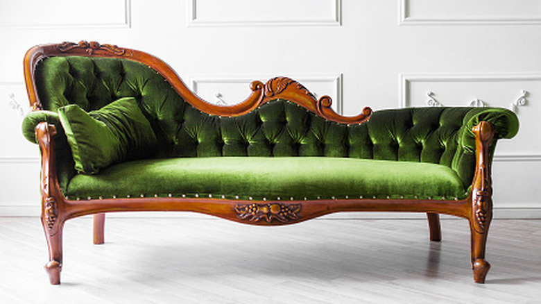 A green velvet couch