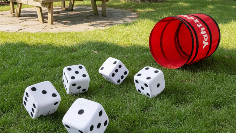 Costco large Yahtzee yard game on a lawn