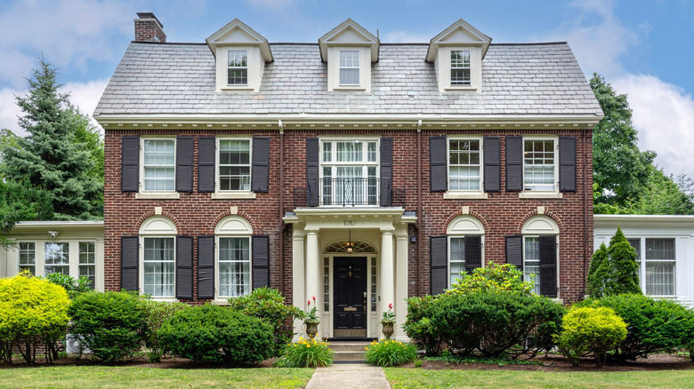 Front of a colonial revival brick home