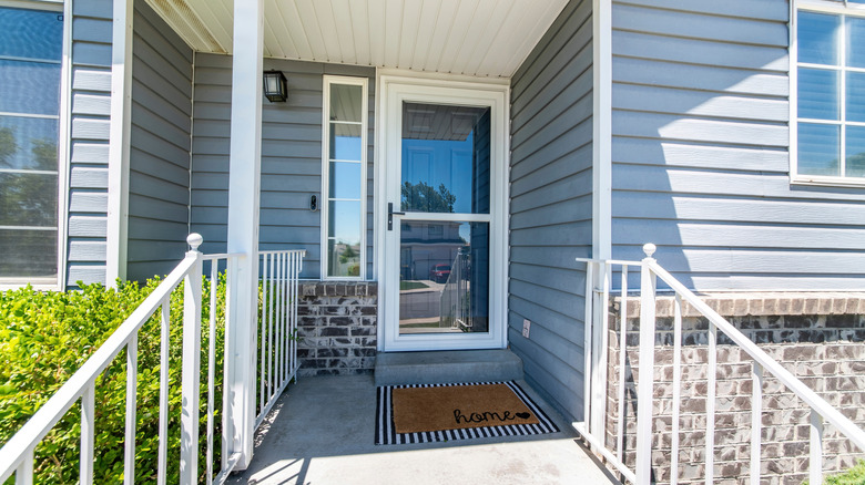 glass storm door on a front door of house