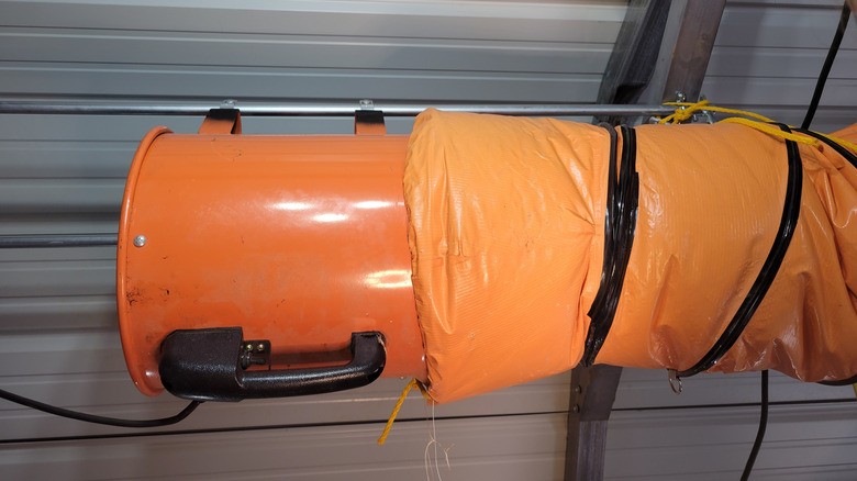 Portable exhaust fan reused as workshop 