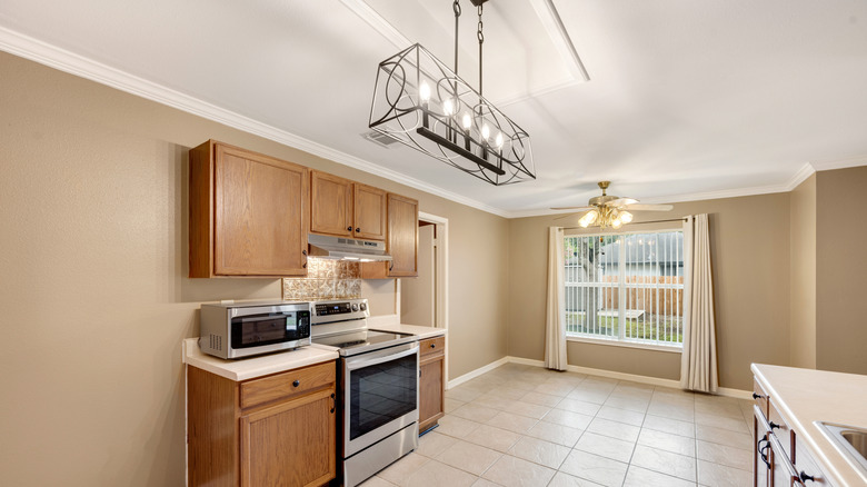Kitchen with honey oak cabinets