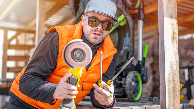 Lawn mover blade sharpening with a file and angle grinder
