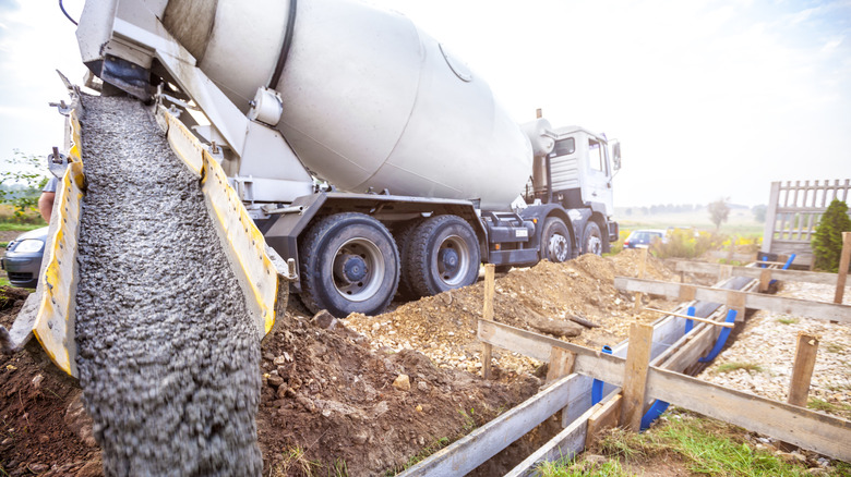 Ready-mixed concrete being poured from a mixer truck