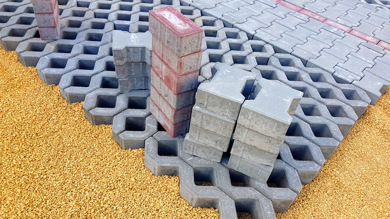 Concrete boxes and trellis on what appears to be a construction site