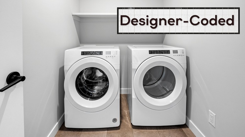 A small white laundry room
