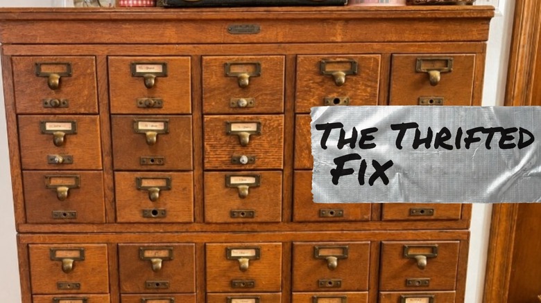 Card catalog drawer filled with paint supplies
