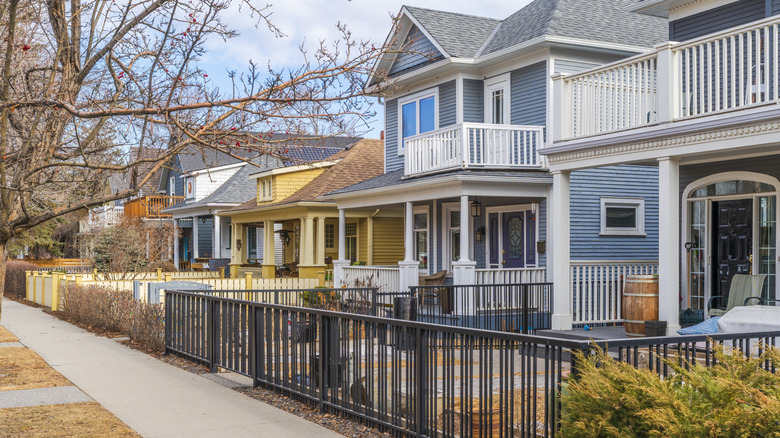 Rows of pastel-colored houses in a quiet neighborhood