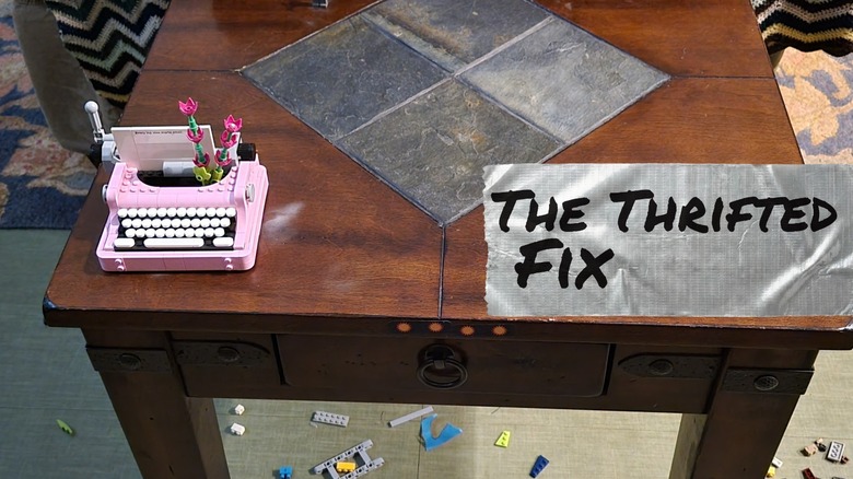 A thrifted end table surrounded by Lego clutter