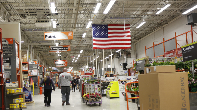 People walking through a Home Depot store