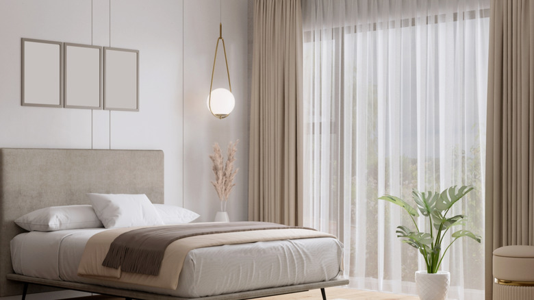 Modern bedroom without a traditional nightstand