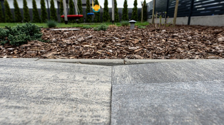 Two concrete slabs sagging at the joint between them