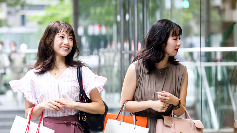 Two women shopping in Japan