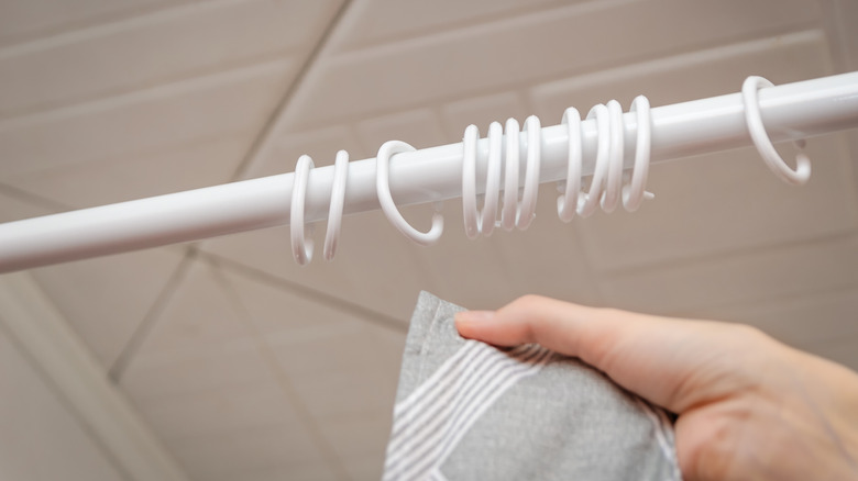 Plastic shower curtain rings without a curtain on them