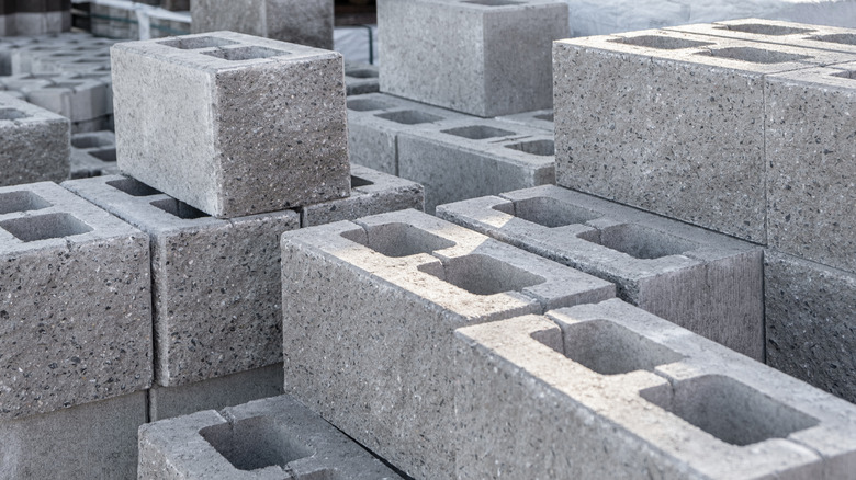 A stack of cinder blocks waiting for use.