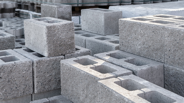 a stack of cinder blocks at a construction site