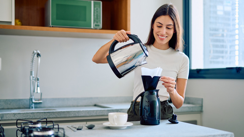 Person making pour-over coffee