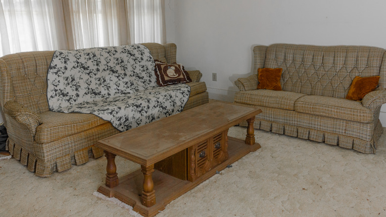 A dated coffee table in a living room