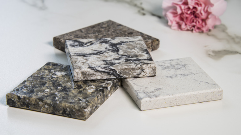 Three granite samples placed on a surface