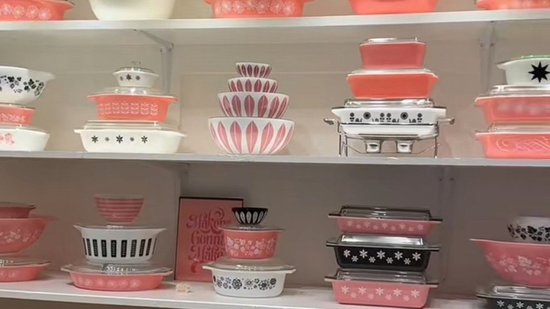 Assorted vintage pink Pyrex dishware