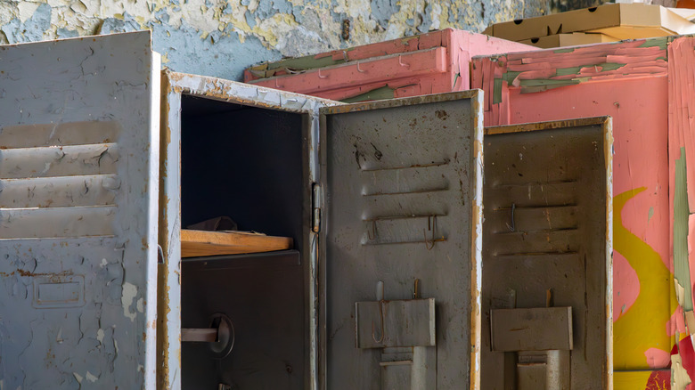 Old metal lockers have their doors open
