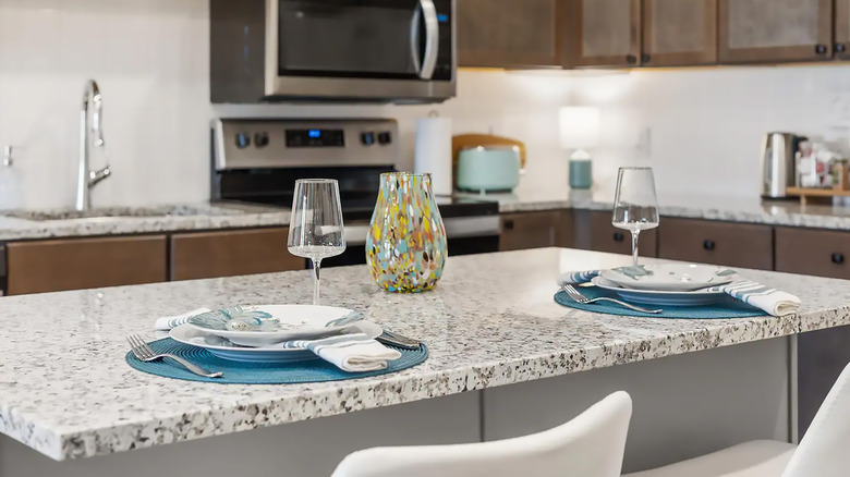 A white and black granite island countertop