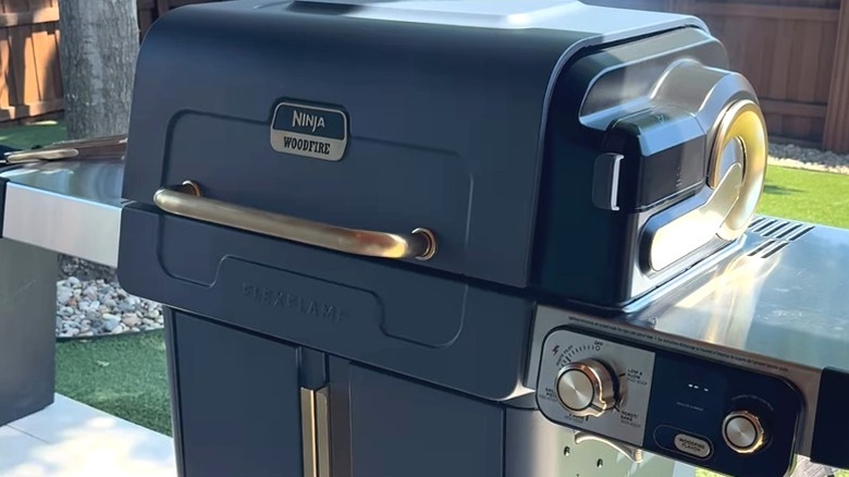 Ninja FlexFlame Outdoor Cooking System on a patio
