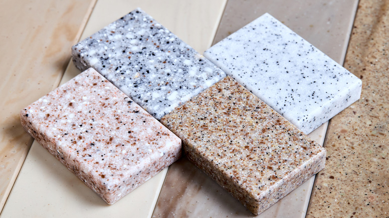 Porcelain countertop sample pieces showing the many colors available.