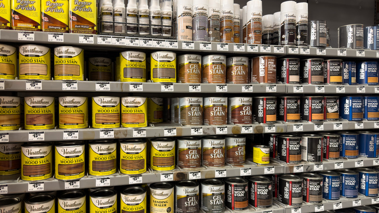 A variety of wood and gel stains in the aisle of a store