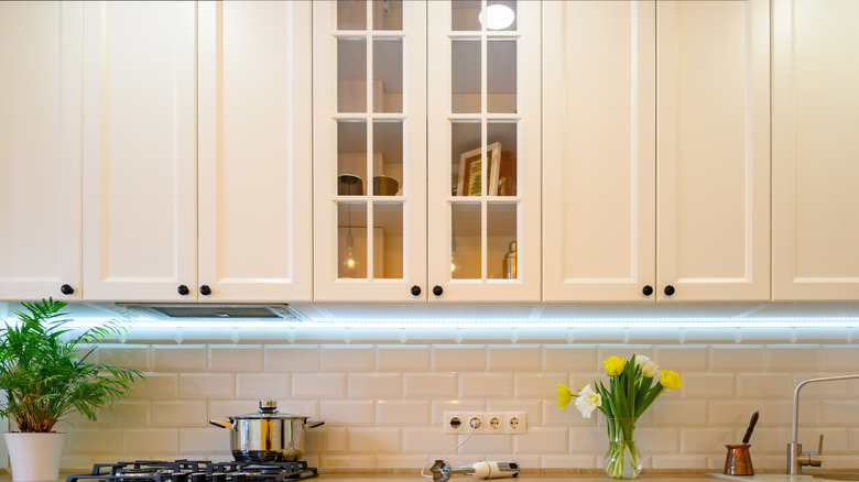 Kitchen with off-white cabinets.